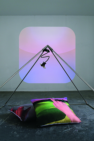 Landscape, 2013, GIF installation, reclining chairs, touchpad devices, welcome mat, sheets, crumpled paper