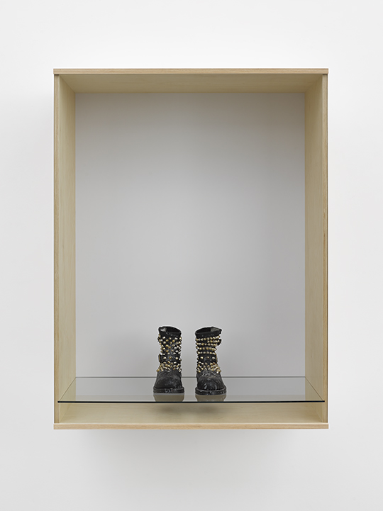 Haim Steinbach, Untitled (boots), 2013 Baltic birch plywood, plastic laminate and glass box; leather and metal boots by Douglas Abraham, 123.2 x 94 x 54.6 cm Courtesy of the artist and Tanya Bonakdar Gallery, New York